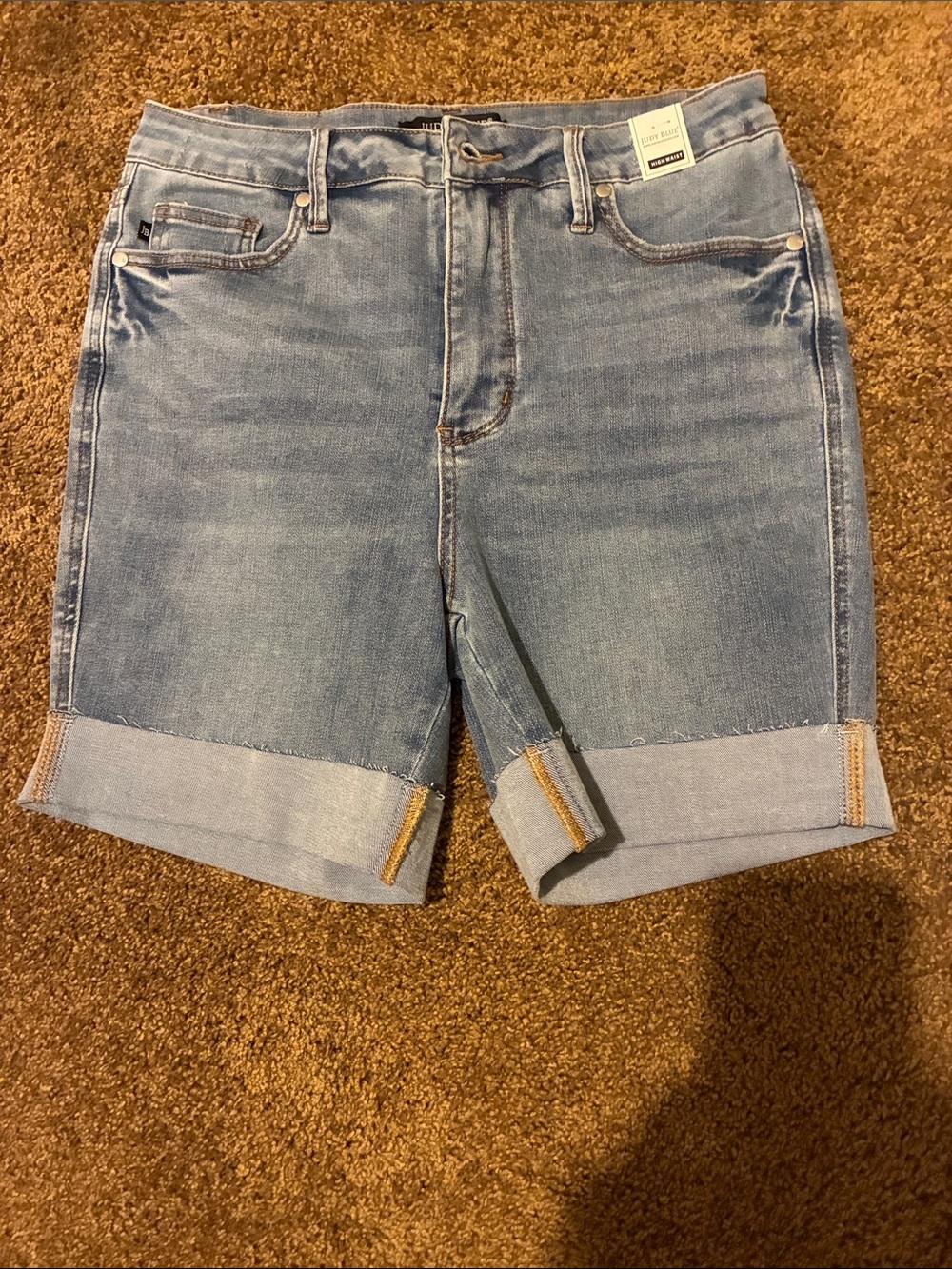 JUDY BLUE. Size Large. Light Wash Denim Cuffed Shorts. Lots of stretch!  NWT